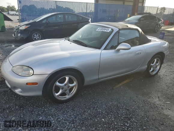 2002 Mazda MX-5 Miata Cloth with VIN JM1NB353420220801, listed as a Copart auction lot 61808645 with 116,451 mi miles and Salvage title. Bid and sale history available at DreamBid. Image 1.
