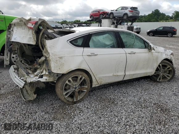 2017 Ford Fusion Titanium z VIN 3FA6P0K93HR227511, wystawiony jako Copart lot #60719505 z przebiegiem Nie podano mil oraz Szkoda całkowita • Salvage title. Historia ofert i sprzedaży dostępna na DreamBid. Obrazek 3.