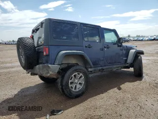 2013 Jeep Wrangler Unlimited Rubicon with VIN 1C4BJWFG5DL572795, listed as a Copart auction lot 62132425 with 149,695 mi miles and Salvage title. Bid and sale history available at DreamBid. Image 3.