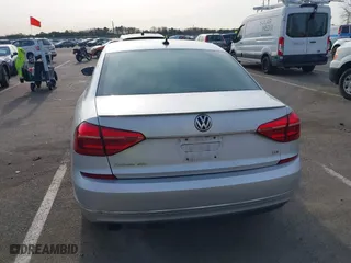 2016 Volkswagen Passat 1.8T SEL with VIN 1VWCT7A3XGC018484, listed as a IAAI auction lot 41763388 with 123,484 mi miles. Bid and sale history available at carsss.com. Image 16.