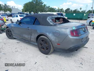 2011 Ford Mustang V6 with VIN 1ZVBP8EM3B5129187, listed as a IAAI auction lot 42555189 with 199,261 mi miles and . Bid and sale history available at DreamBid. Image 3.