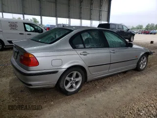 2000 BMW 3 Series 323i with VIN WBAAM3348YFP73443, listed as a Copart auction lot 54165575 with 334,761 mi miles and Salvage title. Bid and sale history available at DreamBid. Image 3.