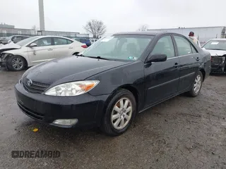 2003 Toyota Camry LE with VIN 4T1BE30K13U144114, listed as a IAAI auction lot 41829879 with 60,385 mi miles and . Bid and sale history available at DreamBid. Image 2.