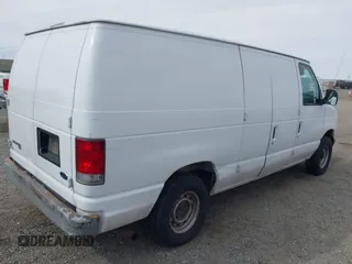1998 Ford Econoline Cargo with VIN 1FTRE142XWHC01733, listed as a IAAI auction lot 41685605 with 154,476 mi miles. Bid and sale history available at carsss.com. Image 4.