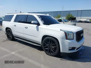 2017 GMC Yukon XL SLT z VIN 1GKS2GKC6HR114955, wystawiony jako IAAI lot #42172782 z przebiegiem 174 717 mil mil oraz . Historia ofert i sprzedaży dostępna na DreamBid. Obrazek 1.