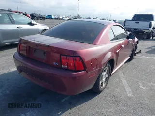 2004 Ford Mustang Standard with VIN 1FAFP404X4F118131, listed as a IAAI auction lot 41895607 with 134,418 mi miles. Bid and sale history available at carsss.com. Image 4.