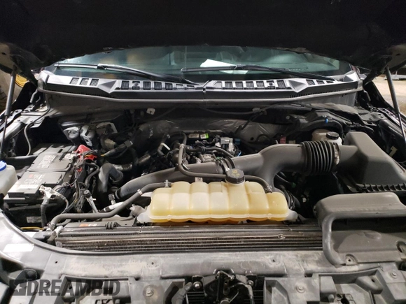 2020 Ford F-150 XL with VIN 1FTEW1EP2LKF10584, listed as a Copart auction lot 60520615 with 64,150 mi miles and Salvage title. Bid and sale history available at DreamBid. Image 11.