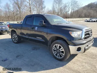 2012 Toyota Tundra 4WD Truck with VIN 5TFUM5F1XCX027852, listed as a Copart auction lot 48555935 with 172,591 mi miles and Salvage Title. Bid and sale history available at carsss.com. Image 4.