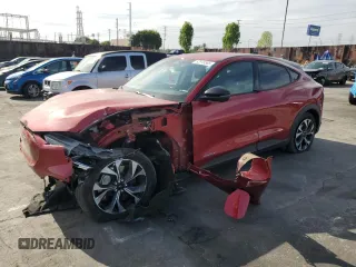 2024 Ford Mustang Mach-E Select z VIN 3FMTK1R44RMA21975, wystawiony jako Copart lot #52915565 z przebiegiem 14 969 mil mil oraz Szkoda całkowita • Salvage title. Historia ofert i sprzedaży dostępna na DreamBid. Obrazek 1.