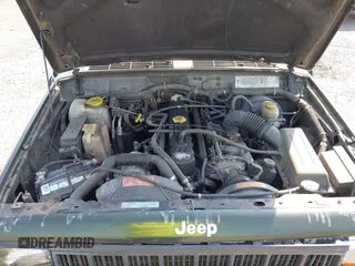 1996 Jeep Cherokee Sport with VIN 1J4FJ68S0TL211339, listed as a IAAI auction lot 42164217 with 193,080 mi miles and . Bid and sale history available at DreamBid. Image 10.
