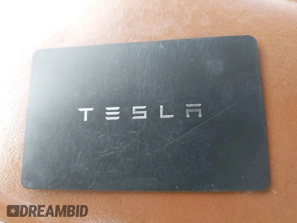 2021 Tesla Model Y Long Range with VIN 5YJYGDEE0MF265339, listed as a IAAI auction lot 41975058 with 51,292 mi miles and . Bid and sale history available at DreamBid. Image 11.