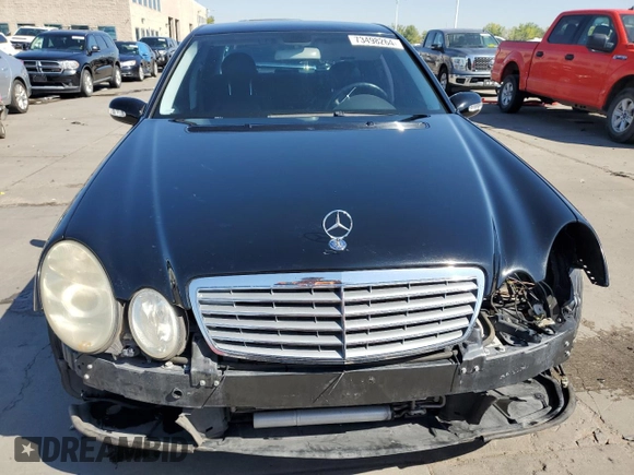 2003 Mercedes-Benz E-Class 5.0L with VIN WDBUF70J13A141237, listed as a Copart auction lot 73498264 with 138,623 mi miles and Salvage Title. Bid and sale history available at carsss.com. Image 5.