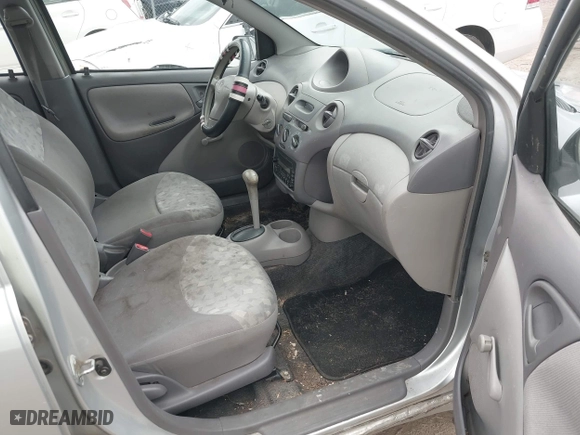 2002 Toyota ECHO with VIN JTDBT123X20203719, listed as a IAAI auction lot 42091031 with 258,946 mi miles. Bid and sale history available at carsss.com. Image 5.