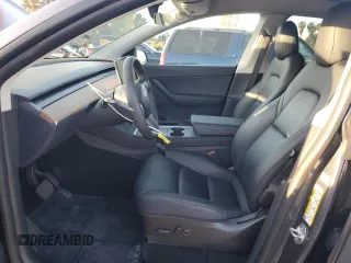 2022 Tesla Model Y Long Range z VIN 7SAYGAEE9NF366382, wystawiony jako Copart lot #52179515 z przebiegiem 41 654 mil mil oraz Szkoda całkowita • Salvage title. Historia ofert i sprzedaży dostępna na DreamBid. Obrazek 7.