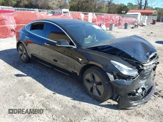 2019 Tesla Model 3 Mid Range with VIN 5YJ3E1EA2KF306286, listed as a IAAI auction lot 41699127 with 56,249 mi miles and . Bid and sale history available at carsss.com. Image 1.