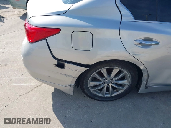 2014 Infiniti Q50 with VIN JN1BV7AP4EM677506, listed as a IAAI auction lot 40113207 with 142,446 mi miles and . Bid and sale history available at DreamBid. Image 13.
