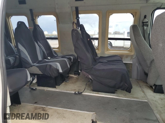 2003 Ford Econoline Cargo with VIN 1FDNS24L63HB98083, listed as a Copart auction lot 65953715 with 121,326 mi miles and Salvage title. Bid and sale history available at DreamBid. Image 11.