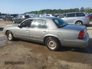 1999 Mercury Grand Marquis LS z VIN 2MEFM75W9XX687526, wystawiony jako Copart lot #51779995 z przebiegiem 196 466 mil mil oraz Szkoda całkowita • Salvage title. Historia ofert i sprzedaży dostępna na DreamBid. Obrazek 2.