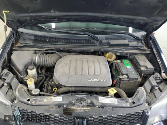 2015 Dodge Grand Caravan SE with VIN 2C4RDGBG5FR550307, listed as a Copart auction lot 56277375 with 121,880 mi miles and Clean Title. Bid and sale history available at DreamBid. Image 12.