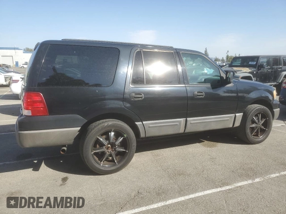 2004 Ford Expedition XLS with VIN 1FMRU13W04LB18695, listed as a Copart auction lot 46652665 with 198,651 mi miles and Salvage Title. Bid and sale history available at carsss.com. Image 3.