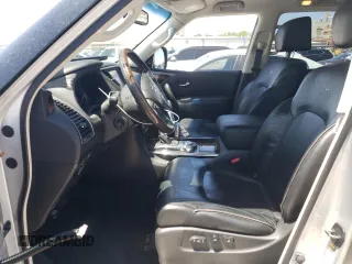 2014 Infiniti QX80 with VIN JN8AZ2NF4E9555172, listed as a Copart auction lot 52302975 with 107,709 mi miles and Salvage Title. Bid and sale history available at DreamBid. Image 7.