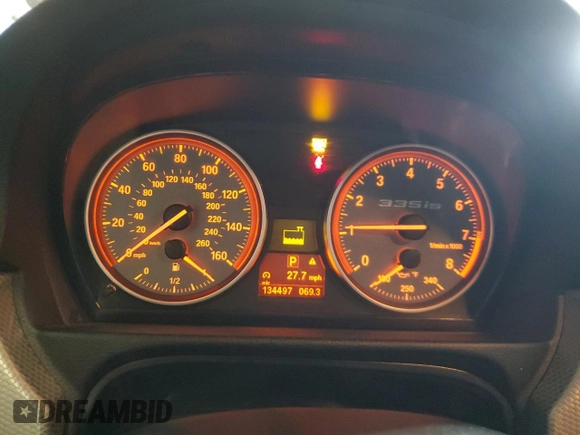 2011 BMW 3 Series 335is with VIN WBAKG1C56BE599457, listed as a Copart auction lot 52412655 with 134,497 mi miles and Clean title. Bid and sale history available at DreamBid. Image 9.