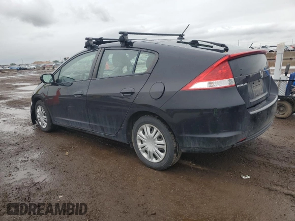 2010 Honda Insight LX with VIN JHMZE2H59AS022362, listed as a Copart auction lot 59442435 with 161,009 mi miles and Salvage title. Bid and sale history available at DreamBid. Image 2.