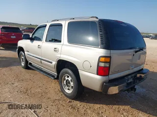 2005 GMC Yukon SLT with VIN 1GKEK13T95R203827, listed as a IAAI auction lot 41815086 with 136,671 mi miles. Bid and sale history available at carsss.com. Image 3.
