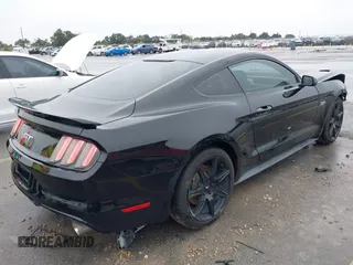 2016 Ford Mustang GT with VIN 1FA6P8CFXG5317372, listed as a IAAI auction lot 40971989 with 118,032 mi miles. Bid and sale history available at carsss.com. Image 4.