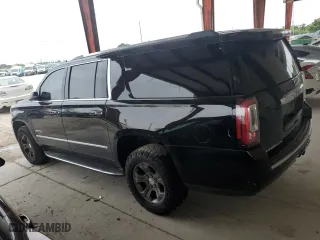 2020 GMC Yukon XL Denali with VIN 1GKS1HKJ6LR127236, listed as a Copart auction lot 51928885 with 143,579 mi miles and Salvage Title. Bid and sale history available at carsss.com. Image 2.