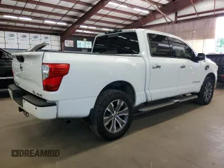 2017 Nissan Titan Pro-4X z VIN 1N6AA1E59HN504294, wystawiony jako Copart lot #65590525 z przebiegiem 160 695 mil mil oraz Czysty tytuł • Clean title. Historia ofert i sprzedaży dostępna na DreamBid. Obrazek 3.