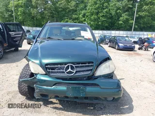 2000 Mercedes-Benz M 320/430/500 z VIN 4JGAB54E9YA180890, wystawiony jako IAAI lot #42151065 z przebiegiem 98 866 mil mil oraz . Historia ofert i sprzedaży dostępna na DreamBid. Obrazek 12.