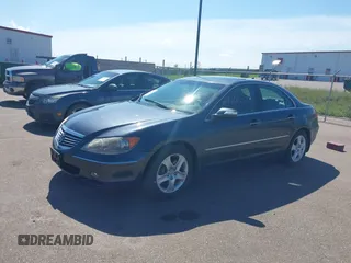 2005 Acura RL with VIN JH4KB16565C018969, listed as a IAAI auction lot 42663552 with 160,007 mi miles and . Bid and sale history available at DreamBid. Image 2.