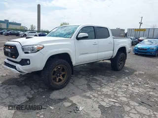 2018 Toyota Tacoma SR with VIN 3TMCZ5AN5JM125066, listed as a IAAI auction lot 41961168 with 88,497 mi miles. Bid and sale history available at carsss.com. Image 20.