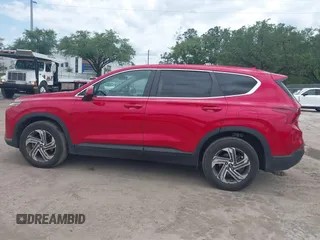 2022 Hyundai Santa Fe SE with VIN 5NMS14AJ6NH376410, listed as a IAAI auction lot 42005742 with 46,414 mi miles and . Bid and sale history available at DreamBid. Image 14.