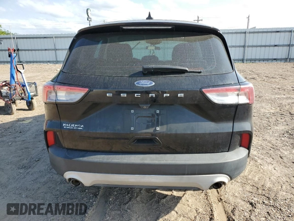 2021 Ford Escape S с VIN 1FMCU0F64MUA47572, выставлен на аукционе Copart как лот 52890665 с пробегом Не указан миль и Списание • Salvage title. История ставок и продаж доступна на DreamBid. Изображение 6.