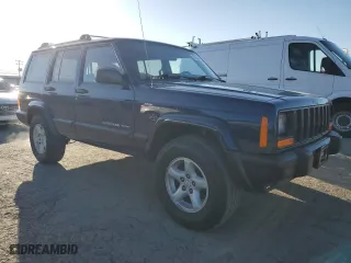 2001 Jeep Cherokee Sport with VIN 1J4FF48S61L617340, listed as a Copart auction lot 52340995 with 210,256 mi miles and Clean Title. Bid and sale history available at carsss.com. Image 4.