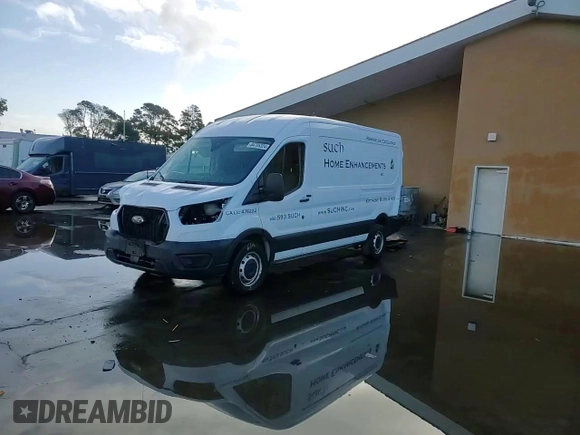 2021 Ford Transit Cargo with VIN 1FTBR1CG7MKA88875, listed as a Copart auction lot 84705324 with 23,654 mi miles and Salvage Title. Bid and sale history available at DreamBid. Image 11.