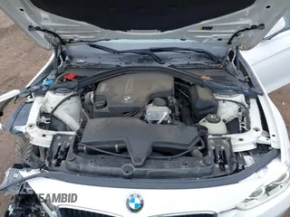 2018 BMW 3 Series 320i xDrive z VIN WBA8E5G5XJNU47665, wystawiony jako IAAI lot #42332838 z przebiegiem 97 821 mil mil oraz . Historia ofert i sprzedaży dostępna na DreamBid. Obrazek 10.