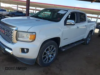 2018 GMC Canyon 4WD Denali z VIN 1GTP6EE11J1178961, wystawiony jako IAAI lot #42499884 z przebiegiem 71 309 mil mil oraz . Historia ofert i sprzedaży dostępna na DreamBid. Obrazek 17.