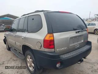 2002 GMC Envoy SLT with VIN 1GKDT13S522420800, listed as a IAAI auction lot 41624195 with 255,745 mi miles. Bid and sale history available at carsss.com. Image 3.