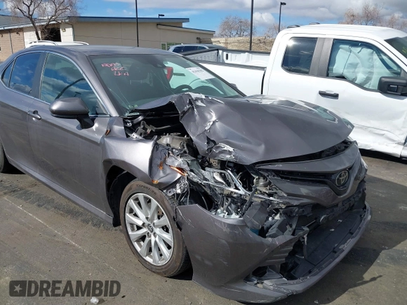 2020 Toyota Camry LE with VIN 4T1C11AK3LU363417, listed as a IAAI auction lot 41430382 with 130,837 mi miles. Bid and sale history available at carsss.com. Image 12.