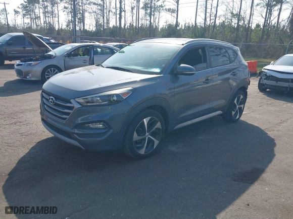 2017 Hyundai Tucson Value with VIN KM8J33A24HU281183, listed as a IAAI auction lot 41563886 with 71,110 mi miles. Bid and sale history available at carsss.com. Image 17.
