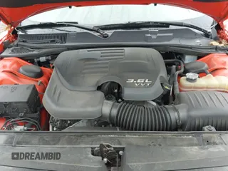 2019 Dodge Challenger SXT with VIN 2C3CDZGG5KH628146, listed as a IAAI auction lot 43019820 with 54,400 mi miles and . Bid and sale history available at DreamBid. Image 23.