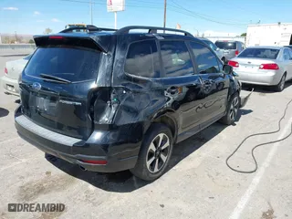 2018 Subaru Forester Limited with VIN JF2SJALC4JH473678, listed as a IAAI auction lot 41827125 with 118,365 mi miles. Bid and sale history available at carsss.com. Image 4.