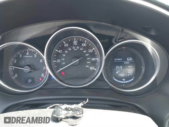 2016 Mazda CX-5 Grand Touring with VIN JM3KE4DY9G0893174, listed as a IAAI auction lot 41887814 with 79,811 mi miles. Bid and sale history available at carsss.com. Image 7.
