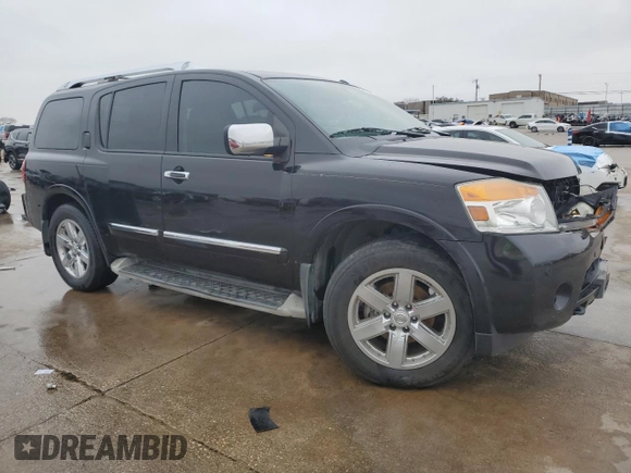 2014 Nissan Armada Platinum z VIN 5N1BA0NF5EN601168, wystawiony jako Copart lot #44590395 z przebiegiem Nie podano mil oraz Szkoda całkowita • Salvage title. Historia ofert i sprzedaży dostępna na DreamBid. Obrazek 4.