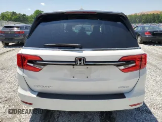 2023 Honda Odyssey Touring с VIN 5FNRL6H84PB071841, выставлен на аукционе Copart как лот 56030675 с пробегом 24 615 миль миль и Списание • Salvage title. История ставок и продаж доступна на DreamBid. Изображение 6.