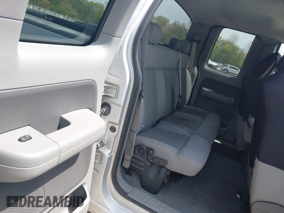 2005 Ford F-150 STX with VIN 1FTRX14W85NA00409, listed as a IAAI auction lot 42125903 with 160,230 mi miles and . Bid and sale history available at DreamBid. Image 8.
