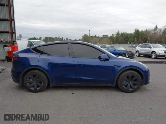 2021 Tesla Model Y Long Range with VIN 5YJYGDEE9MF071120, listed as a IAAI auction lot 40870088 with 73,438 mi miles and . Bid and sale history available at carsss.com. Image 14.